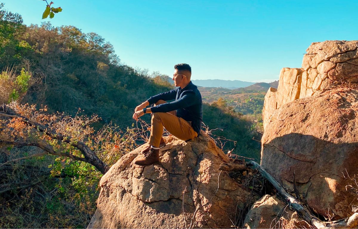 Justin Huynh on a cliff